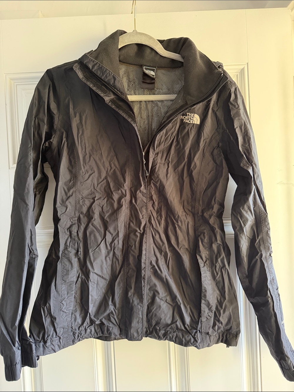 Black North Face wind breaker jacket